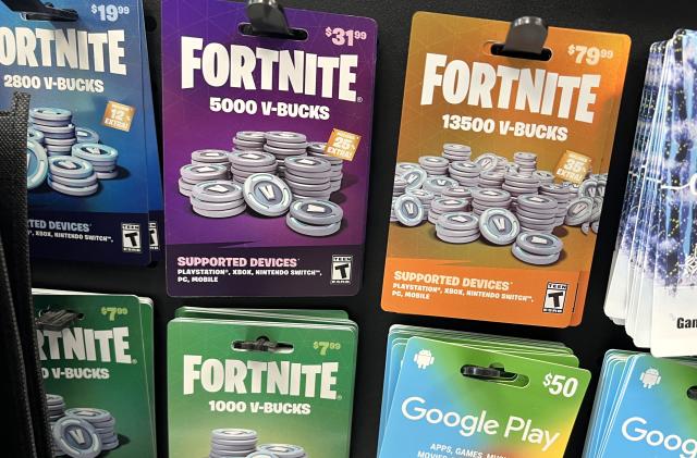 Fortnite V-Bucks are offered for sale at a video game retailer on December 19, 2022 in Chicago, Illinois. Epic Games, the maker of Fortnite, has been ordered by the Federal Trade Commission to pay $520 million to settle allegations that it collected personal data from children without the consent of a parent or guardian. 